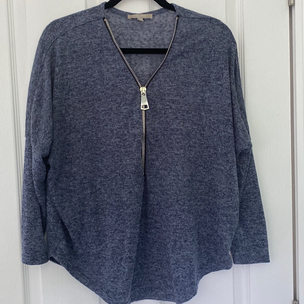 Joan Vass light weight zip up long sleeved blouse.